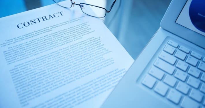 Close Up Business Document Laptop Desk - Online Contract Documents